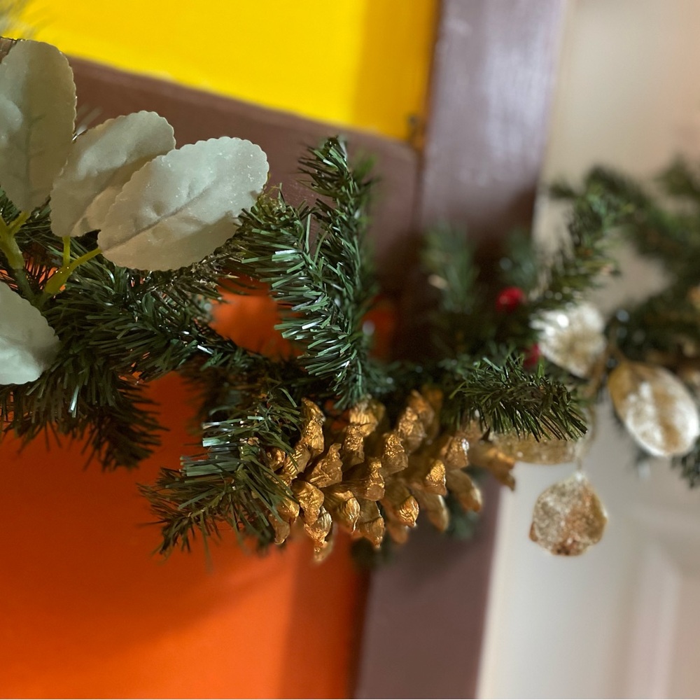9 foot gold and silver faux evergreen garland, pine cones, berries